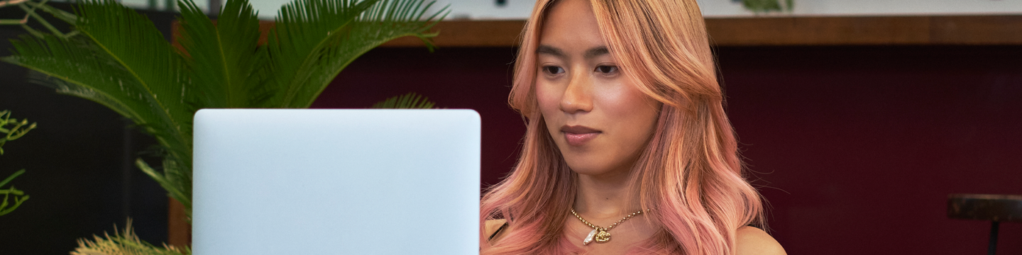 Volunteer blog header asian trans woman dyed hair.png